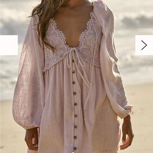 Free People Summer Struttin’ Mini Dress in Ivory. Size small.